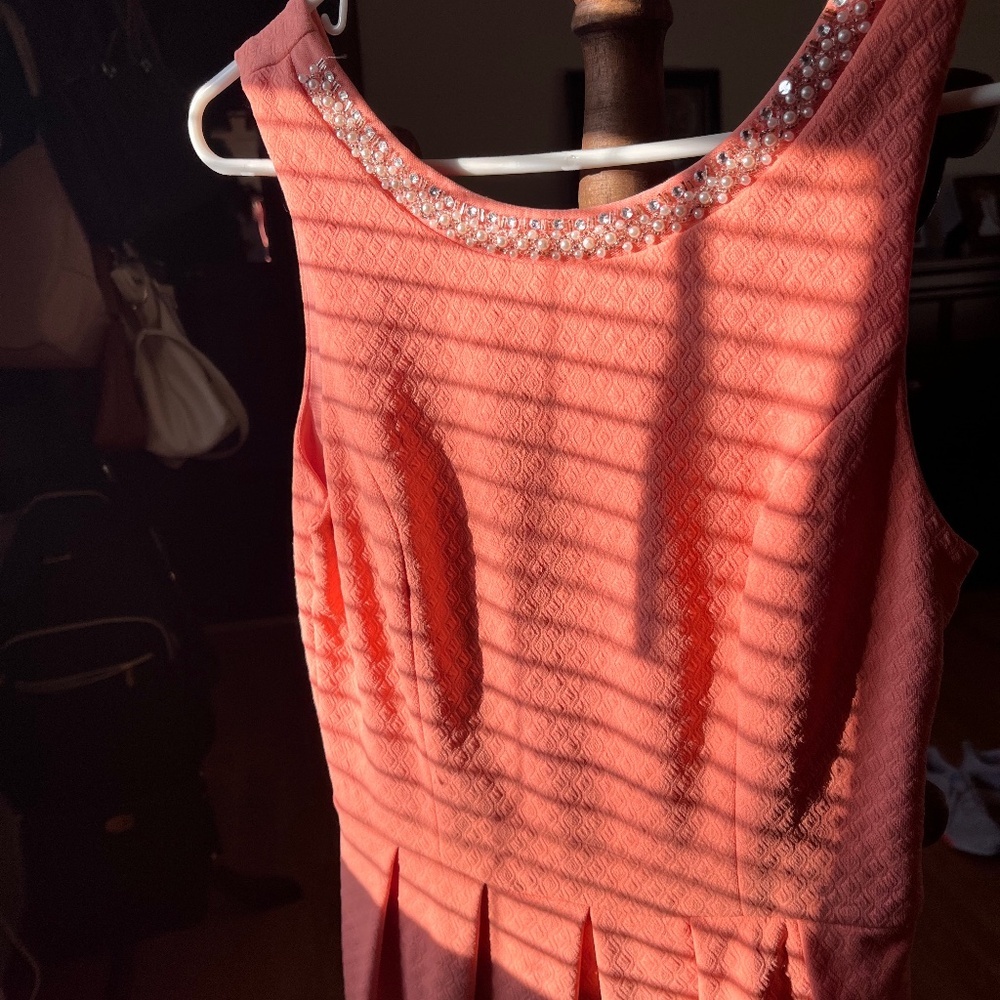 Coral pink dress with bow in back